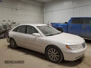 2009 Hyundai Azera Limited z VIN KMHFC46F09A372929, wystawiony jako Copart lot #88455705 z przebiegiem 111 222 mil mil oraz Szkoda całkowita • Salvage title. Historia ofert i sprzedaży dostępna na DreamBid. Obrazek 4.