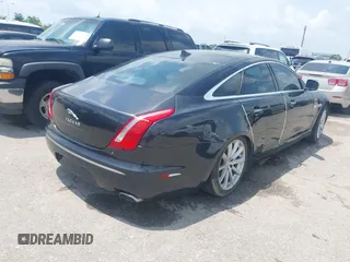 2013 Jaguar XJ with VIN SAJWA1C77D8V44610, listed as a IAAI auction lot 42150382 with Not Provided miles and . Bid and sale history available at DreamBid. Image 4.