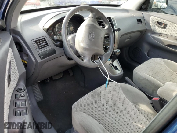 2005 Hyundai Tucson GLS with VIN KM8JN12D95U051374, listed as a Copart auction lot 73854704 with 0 mi miles and Salvage Title. Bid and sale history available at carsss.com. Image 8.