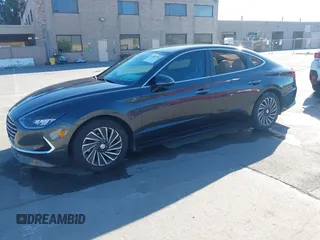 2020 Hyundai Sonata Hybrid Ultimate with VIN KMHL34JJ0LA011724, listed as a IAAI auction lot 41861571 with 1 mi miles. Bid and sale history available at carsss.com. Image 2.