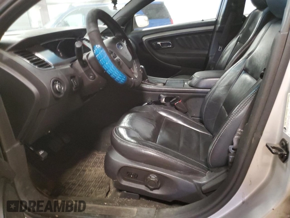 2013 Ford Taurus SEL z VIN 1FAHP2E82DG174647, wystawiony jako Copart lot #53784995 z przebiegiem Nie podano mil oraz Szkoda całkowita • Salvage title. Historia ofert i sprzedaży dostępna na DreamBid. Obrazek 7.
