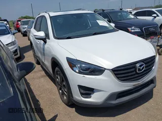 2016 Mazda CX-5 Grand Touring z VIN JM3KE2DY6G0727778, wystawiony jako IAAI lot #42130789 z przebiegiem Nie podano mil oraz . Historia ofert i sprzedaży dostępna na DreamBid. Obrazek 1.