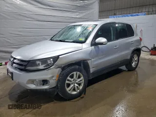 2013 Volkswagen Tiguan SE with VIN WVGBV3AX0DW592165, listed as a Copart auction lot 58915665 with 105,438 mi miles and Salvage title. Bid and sale history available at DreamBid. Image 1.