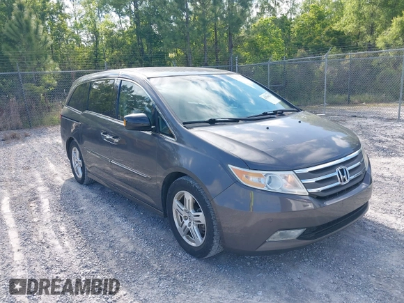 2012 Honda Odyssey Touring с VIN 5FNRL5H93CB133288, выставлен на аукционе IAAI как лот 42020622 с пробегом 184 077 миль миль и . История ставок и продаж доступна на DreamBid. Изображение 1.