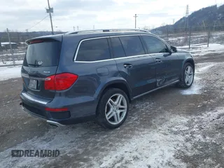 2014 Mercedes-Benz GL-Class GL 550 with VIN 4JGDF7DE3EA321574, listed as a IAAI auction lot 41598200 with 93,190 mi miles. Bid and sale history available at carsss.com. Image 4.