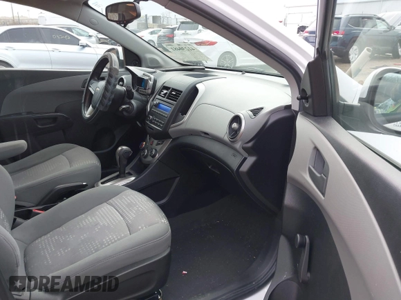 2015 Chevrolet Sonic LS with VIN 1G1JA6SH3F4160438, listed as a IAAI auction lot 41230481 with 98,424 mi miles and . Bid and sale history available at DreamBid. Image 5.