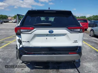 2024 Toyota RAV4 Hybrid XSE with VIN 2T3E6RFV9RW077941, listed as a IAAI auction lot 42012134 with 31,009 mi miles and . Bid and sale history available at DreamBid. Image 16.