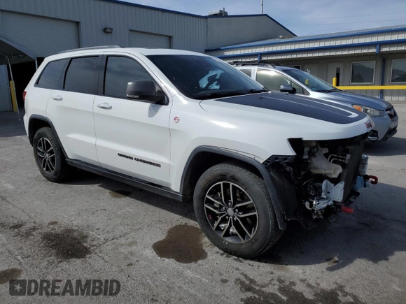 2017 Jeep Grand Cherokee Trailhawk with VIN 1C4RJFLT1HC729163, listed as a Copart auction lot 51115745 with 213,292 mi miles and Salvage title. Bid and sale history available at DreamBid. Image 4.