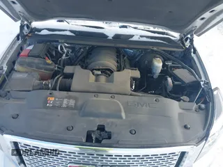 2016 GMC Yukon Denali with VIN 1GKS2CKJ7GR151020, listed as a IAAI auction lot 41539216 with 120,893 mi miles. Bid and sale history available at carsss.com. Image 10.