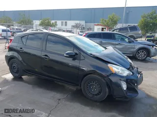 2015 Toyota Prius c One with VIN JTDKDTB3XF1585940, listed as a IAAI auction lot 41263863 with NaN miles. Bid and sale history available at carsss.com. Image 1.