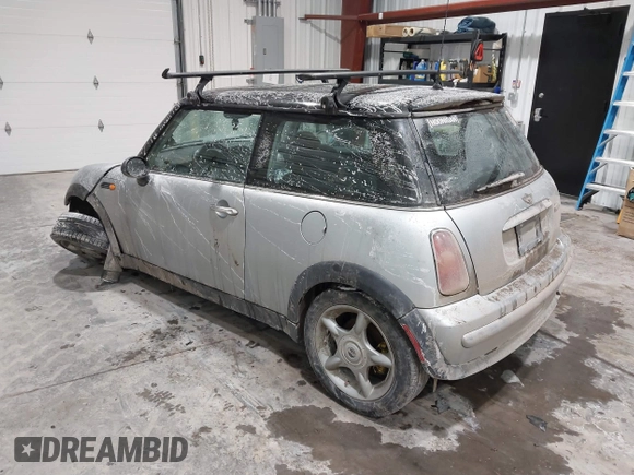 2002 MINI Hardtop with VIN WMWRC33422TC37296, listed as a IAAI auction lot 41385046 with 107,663 mi miles and . Bid and sale history available at DreamBid. Image 3.