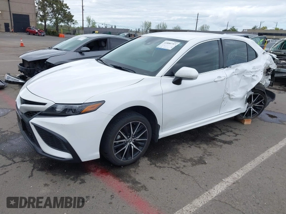 2023 Toyota Camry SE with VIN 4T1G11AK2PU822122, listed as a IAAI auction lot 41880757 with 56,106 mi miles and . Bid and sale history available at DreamBid. Image 2.