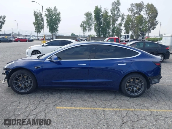 2020 Tesla Model 3 Standard Range Plus z VIN 5YJ3E1EA8LF785010, wystawiony jako IAAI lot #42130951 z przebiegiem 90 072 mil mil oraz . Historia ofert i sprzedaży dostępna na DreamBid. Obrazek 15.