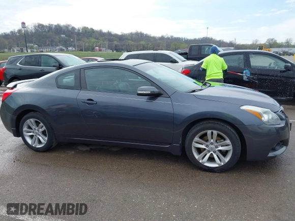 2013 Nissan Altima S with VIN 1N4AL2EP5DC217907, listed as a IAAI auction lot 41877714 with 90,409 mi miles and . Bid and sale history available at DreamBid. Image 13.