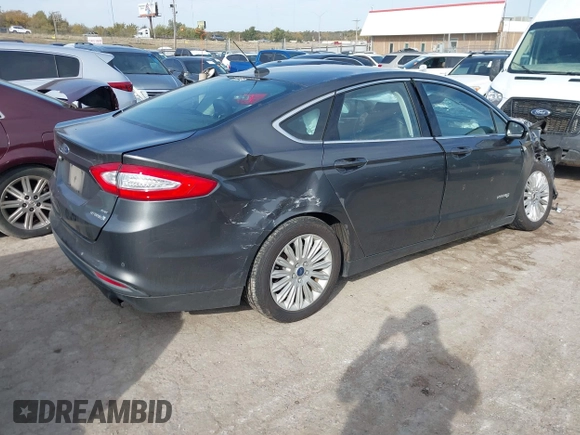 2015 Ford Fusion SE Hybrid with VIN 3FA6P0LUXFR266743, listed as a IAAI auction lot 40862039 with 116,610 mi miles. Bid and sale history available at carsss.com. Image 4.