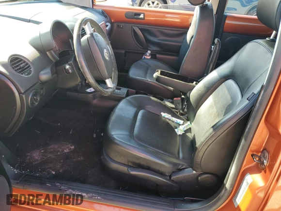 2010 Volkswagen Beetle with VIN 3VWRW3AG8AM035450, listed as a Copart auction lot 77938214 with 48,862 mi miles and Salvage title. Bid and sale history available at DreamBid. Image 7.