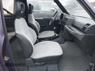 1993 Suzuki Sidekick z VIN 2S3TA01C4P6406238, wystawiony jako IAAI lot #41469419 z przebiegiem 126 667 mil mil oraz . Historia ofert i sprzedaży dostępna na DreamBid. Obrazek 5.