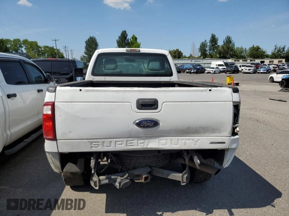 2014 Ford F-250 XL with VIN 1FTBF2B61EEB69314, listed as a Copart auction lot 57801965 with 165,016 mi miles and Salvage title. Bid and sale history available at DreamBid. Image 6.