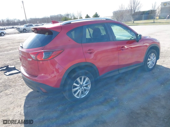 2016 Mazda CX-5 Touring with VIN JM3KE4CY5G0816285, listed as a IAAI auction lot 41888537 with 101,598 mi miles. Bid and sale history available at carsss.com. Image 4.