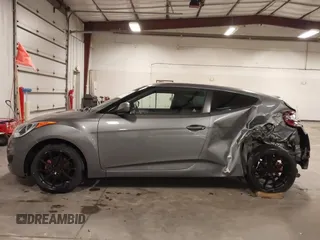2016 Hyundai Veloster with VIN KMHTC6ADXGU272594, listed as a IAAI auction lot 42437409 with 91,620 mi miles and . Bid and sale history available at DreamBid. Image 14.