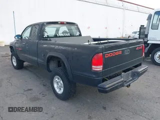 1999 Dodge Dakota SLT with VIN 1B7GG22YXXS229633, listed as a IAAI auction lot 42088939 with 148,049 mi miles and . Bid and sale history available at carsss.com. Image 3.