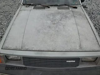 1981 Mazda 626 z VIN JM1GB2216B0531636, wystawiony jako Copart lot #54201075 z przebiegiem 41 823 mil mil oraz Szkoda całkowita • Salvage title. Historia ofert i sprzedaży dostępna na DreamBid. Obrazek 11.