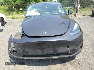 2024 Tesla Model Y с VIN 7SAYGDED1RF092027, выставлен на аукционе Copart как лот 62330775 с пробегом 22 010 миль миль и Списание • Salvage title. История ставок и продаж доступна на DreamBid. Изображение 5.