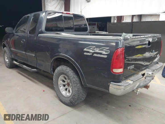 1999 Ford F-150 XL with VIN 1FTRX18L5XKB05347, listed as a IAAI auction lot 41885737 with 250,070 mi miles. Bid and sale history available at carsss.com. Image 3.