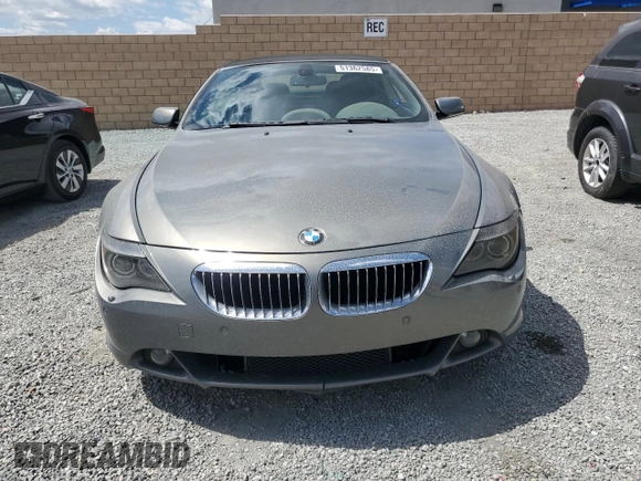 2007 BMW 6 Series 650i z VIN WBAEK13577CN81886, wystawiony jako Copart lot #51362585 z przebiegiem 110 174 mil mil oraz Czysty tytuł • Clean title. Historia ofert i sprzedaży dostępna na DreamBid. Obrazek 5.