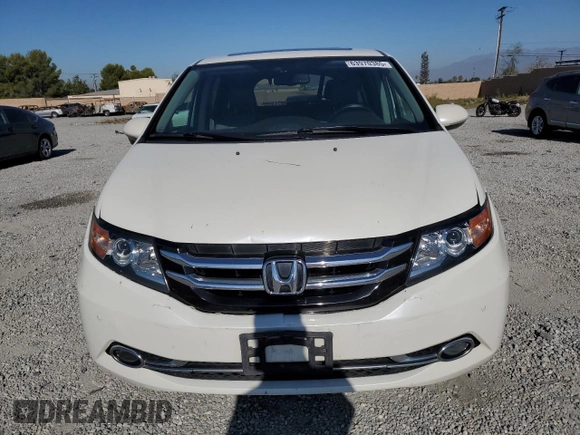 2016 Honda Odyssey Touring Elite with VIN 5FNRL5H9XGB006981, listed as a Copart auction lot 63970385 with 165,164 mi miles and Salvage title. Bid and sale history available at DreamBid. Image 5.