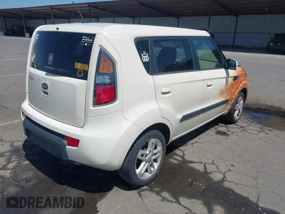 2010 Kia Soul + with VIN KNDJT2A28A7078333, listed as a IAAI auction lot 42097259 with 165,243 mi miles. Bid and sale history available at carsss.com. Image 4.