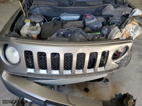 2014 Jeep Patriot Latitude with VIN 1C4NJRFB1ED617164, listed as a Copart auction lot 45481015 with 140,034 mi miles and Salvage Title. Bid and sale history available at carsss.com. Image 14.