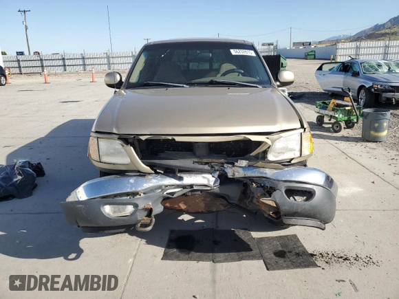 1999 Ford F-150 XL with VIN 1FTRX18L5XKA44484, listed as a Copart auction lot 56232815 with 177,990 mi miles and Salvage title. Bid and sale history available at DreamBid. Image 5.