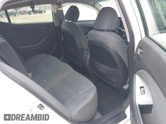 2015 Kia Optima LX with VIN KNAGM4A72F5654352, listed as a IAAI auction lot 41706156 with 119,000 mi miles. Bid and sale history available at carsss.com. Image 8.