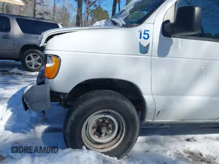 2007 Ford Econoline Cargo Commercial with VIN 1FTNE14WX7DB23318, listed as a IAAI auction lot 41560386 with 209,790 mi miles and . Bid and sale history available at DreamBid. Image 12.