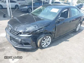 2015 Volkswagen Jetta SE z VIN 3VWD17AJXFM259306, wystawiony jako IAAI lot #42418042 z przebiegiem 199 780 mil mil oraz . Historia ofert i sprzedaży dostępna na DreamBid. Obrazek 16.