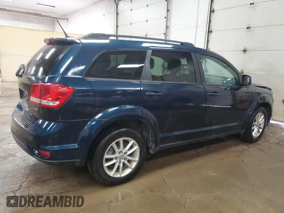 2013 Dodge Journey SXT with VIN 3C4PDDBG2DT519239, listed as a Copart auction lot 61682615 with 248,833 mi miles and Clean title. Bid and sale history available at DreamBid. Image 3.