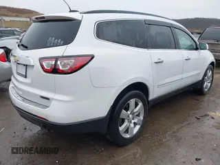 2017 Chevrolet Traverse Premier with VIN 1GNKVJKD5HJ324803, listed as a IAAI auction lot 41464714 with 98,753 mi miles and . Bid and sale history available at DreamBid. Image 4.