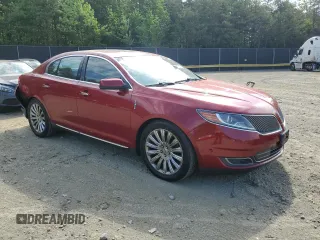 2015 Lincoln MKS with VIN 1LNHL9DK5FG607422, listed as a Copart auction lot 55613525 with 164,590 mi miles and Salvage title. Bid and sale history available at DreamBid. Image 4.