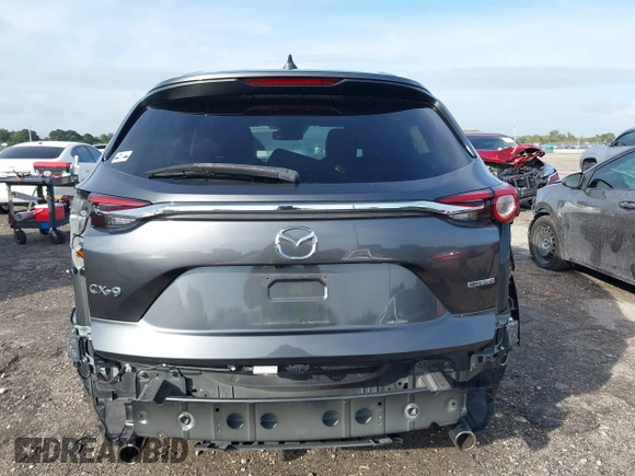 2020 Mazda CX-9 Touring z VIN JM3TCACY5L0412308, wystawiony jako IAAI lot #41208401 z przebiegiem 37 029 mil mil oraz . Historia ofert i sprzedaży dostępna na DreamBid. Obrazek 17.