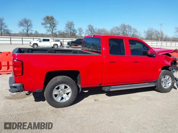2018 Chevrolet Silverado 1500 LT with VIN 1GCRCREC1JZ342110, listed as a IAAI auction lot 41194372 with 73,186 mi miles and . Bid and sale history available at DreamBid. Image 14.