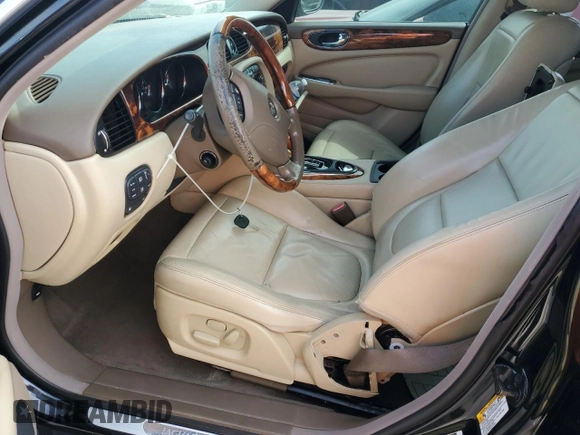2006 Jaguar XJ with VIN SAJWA71BX6SH01193, listed as a Copart auction lot 76382034 with 0 mi miles and Salvage Title. Bid and sale history available at carsss.com. Image 7.