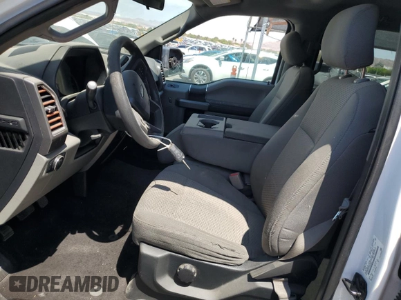 2016 Ford F-150 XLT with VIN 1FTEW1EF7GKE64263, listed as a Copart auction lot 70331214 with 260,006 mi miles and Salvage title. Bid and sale history available at DreamBid. Image 7.