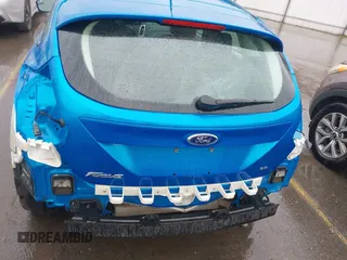 2014 Ford Focus SE z VIN 1FADP3K23EL162634, wystawiony jako IAAI lot #41772913 z przebiegiem 113 405 mil mil oraz . Historia ofert i sprzedaży dostępna na DreamBid. Obrazek 6.