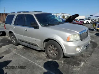 2003 Lincoln Navigator Ultimate with VIN 5LMFU27R93LJ10247, listed as a Copart auction lot 77715274 with 194,422 mi miles and Salvage Title. Bid and sale history available at carsss.com. Image 4.
