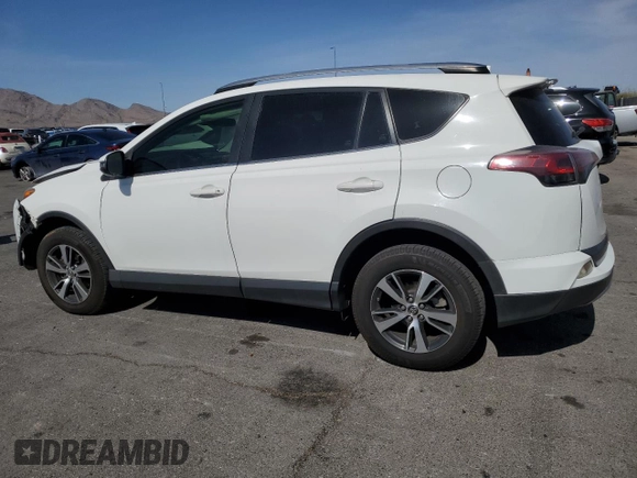 2018 Toyota RAV4 XLE with VIN JTMWFREV0JD123910, listed as a Copart auction lot 52416115 with 84,096 mi miles and Salvage Title. Bid and sale history available at carsss.com. Image 2.