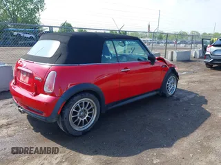 2006 MINI Convertible S with VIN WMWRH33596TK58563, listed as a IAAI auction lot 42210790 with 102,476 mi miles and . Bid and sale history available at DreamBid. Image 4.