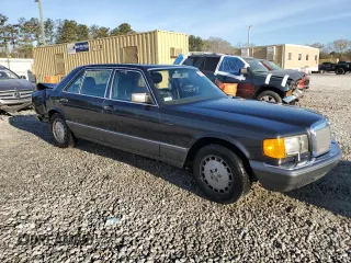 1989 Mercedes-Benz 560 with VIN WDBCA39E9KA463003, listed as a Copart auction lot 49808495 with 125,388 mi miles and Salvage Title. Bid and sale history available at DreamBid. Image 4.