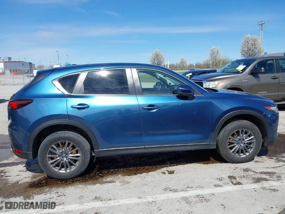 2019 Mazda CX-5 Touring with VIN JM3KFACM9K0686951, listed as a IAAI auction lot 41870797 with 66,303 mi miles. Bid and sale history available at carsss.com. Image 14.
