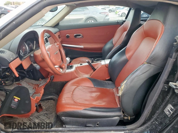 2004 Chrysler Crossfire z VIN 1C3AN69L54X006853, wystawiony jako Copart lot #50780575 z przebiegiem Nie podano mil oraz Tytuł czysty. Historia ofert i sprzedaży dostępna na DreamBid. Obrazek 7.